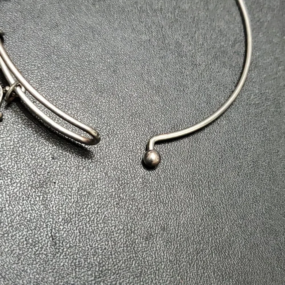Silver tone sailing themed charm bangle bracelet 7.25